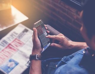 checking phone for news